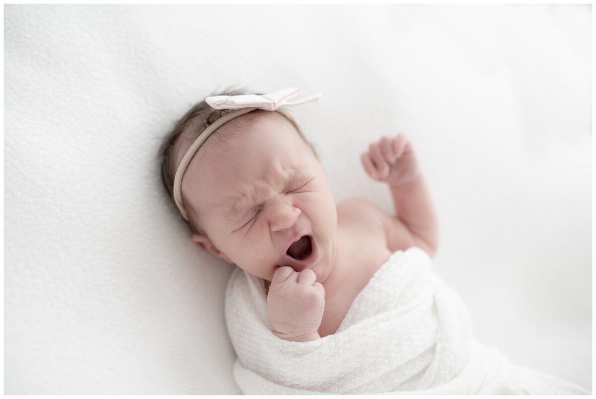 newborn baby yawning for their newborn session 