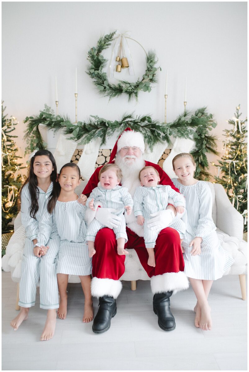 santa photo session in austin texas in white studio